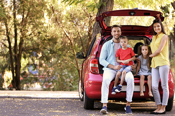 image of family with car